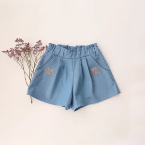 Light Blue Denim Paperbag Waist Shorts with "Wild Bells" Embroidery